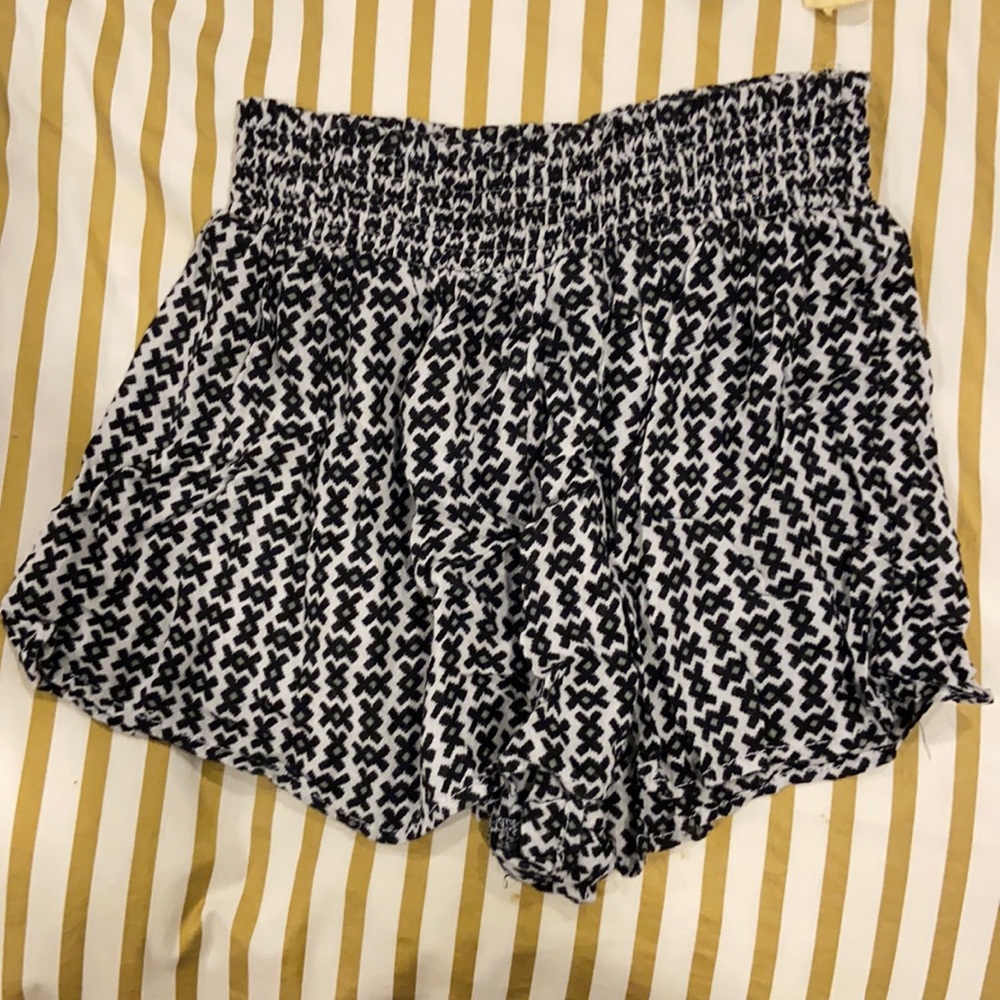 Black white and a little green shorts